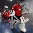 MOSCOW, RUSSIA - MAY 7: Switzerland's Reto Berra #20 leads his team to the ice surface prior to preliminary round action against Kazakhstan at the 2016 IIHF Ice Hockey Championship. (Photo by Andre Ringuette/HHOF-IIHF Images)

